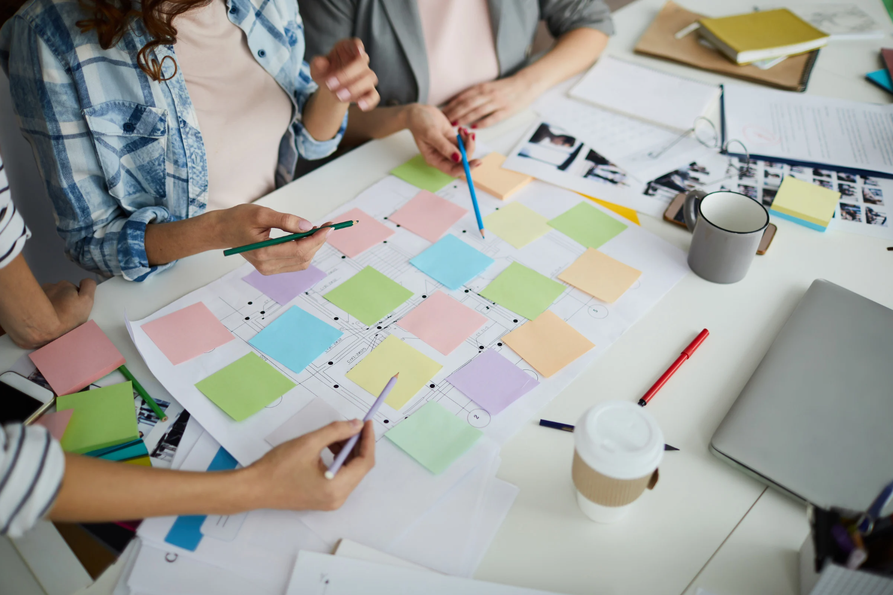 Team collaborating on sprint planning with sticky notes